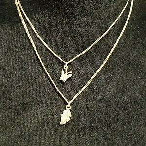 Gold costume necklace, with 2 length chain.